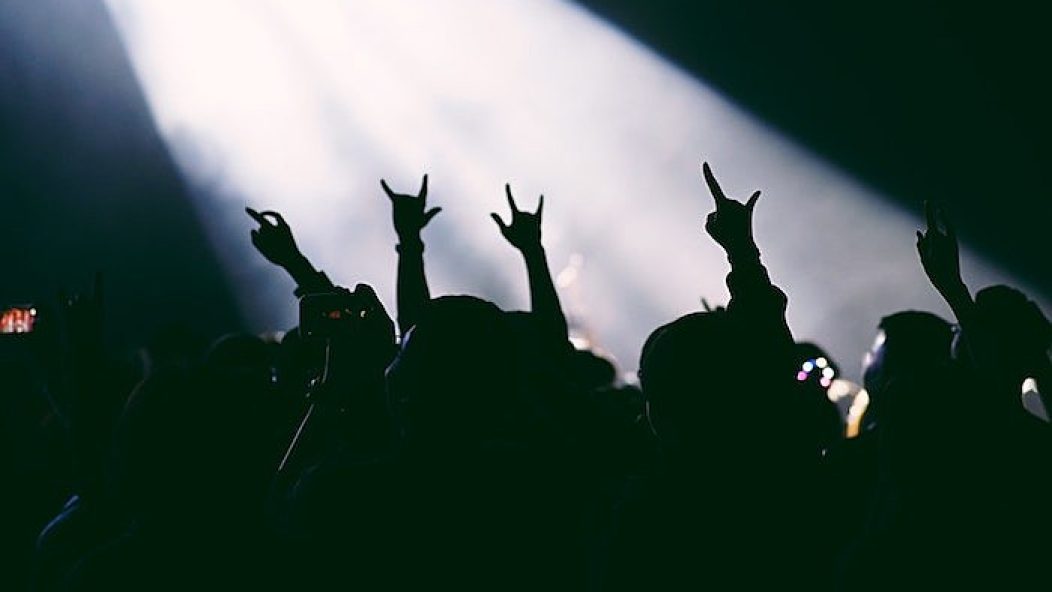 rock on hands concert crowd death metal band logos